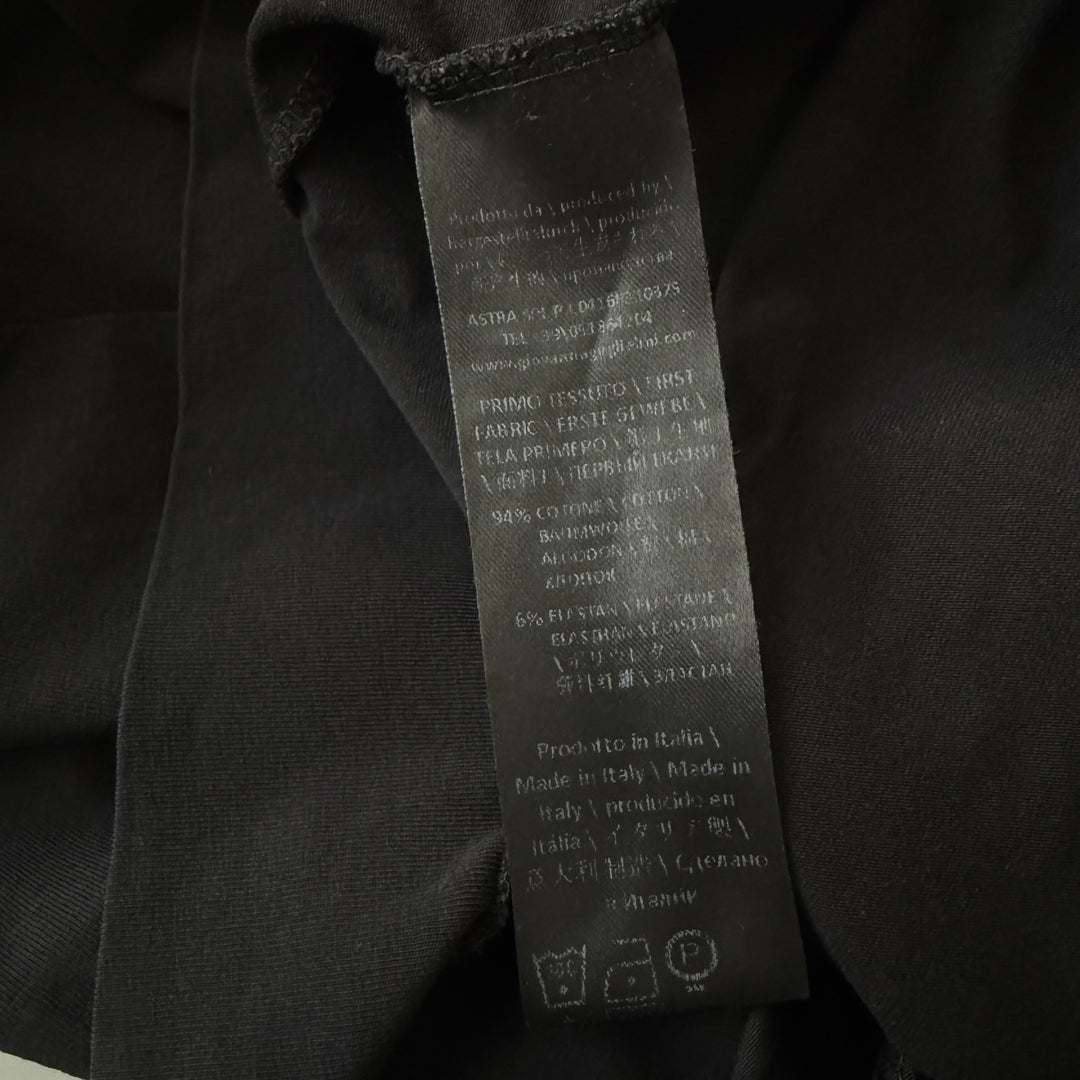 Giovanna Guglielmi – “Working Over Time” black cotton dress